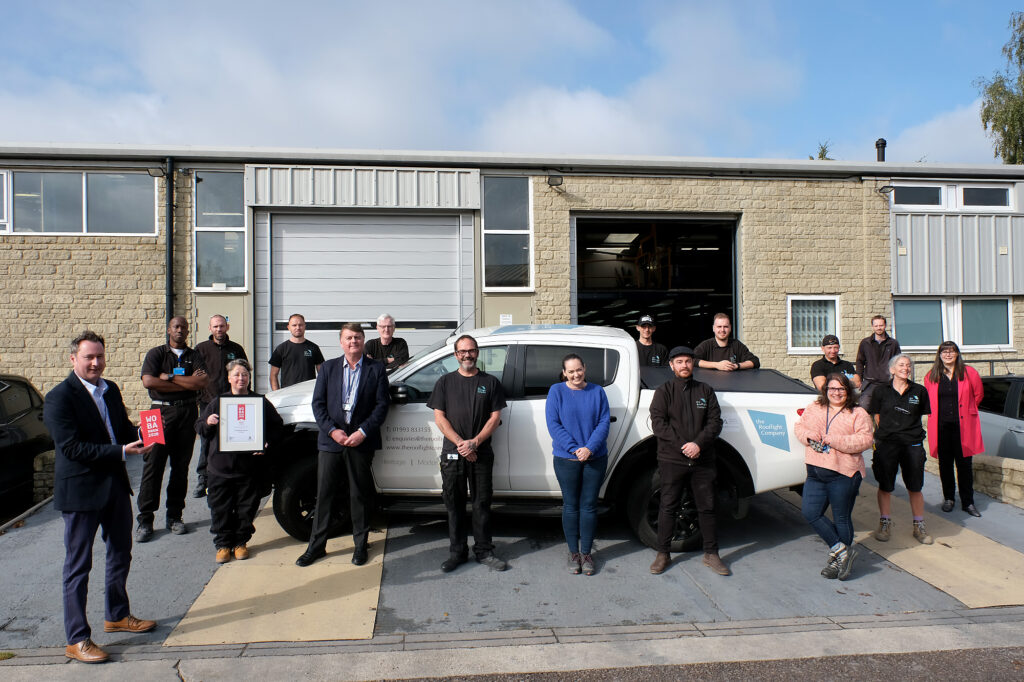 The Rooflight Co team photo with award